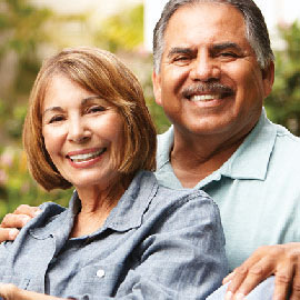 Retired couple smiling.