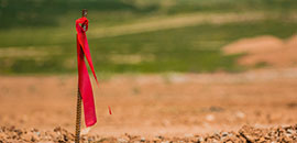 Land construction grade marker.
