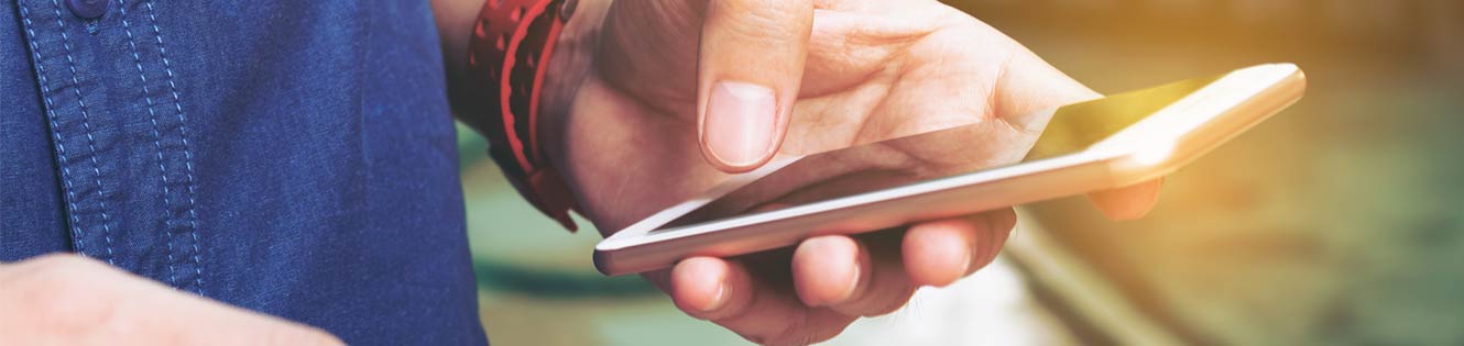 Person using phone to bank.