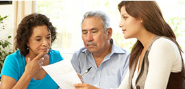 Couple meeting with their mortgage professional.